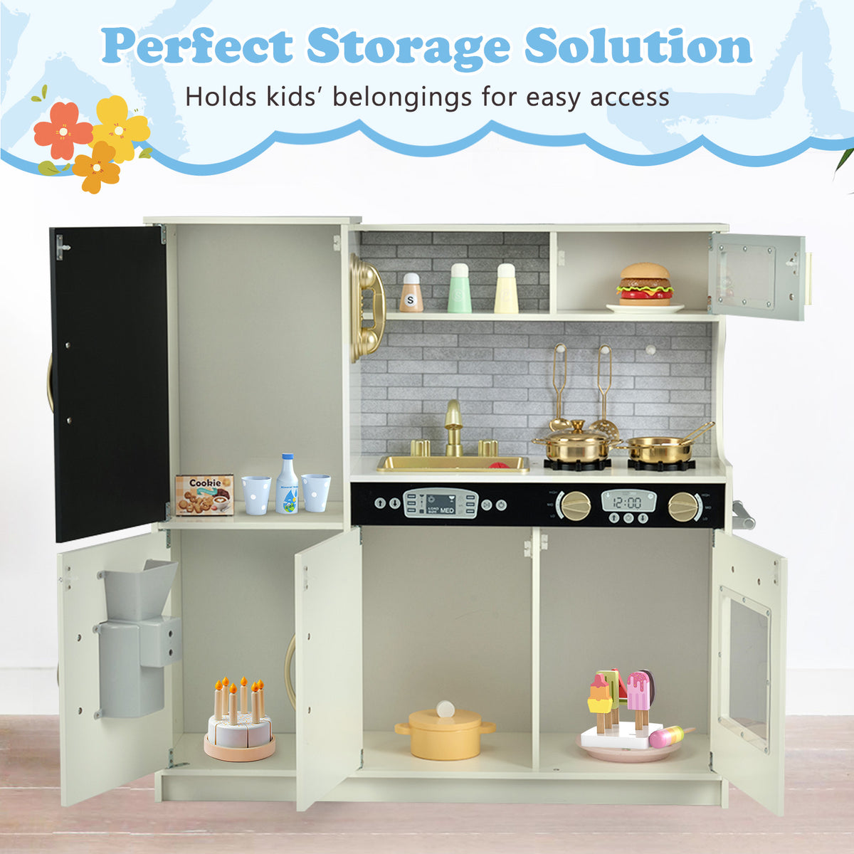 The beige play kitchen with all doors and drawers open showing storage