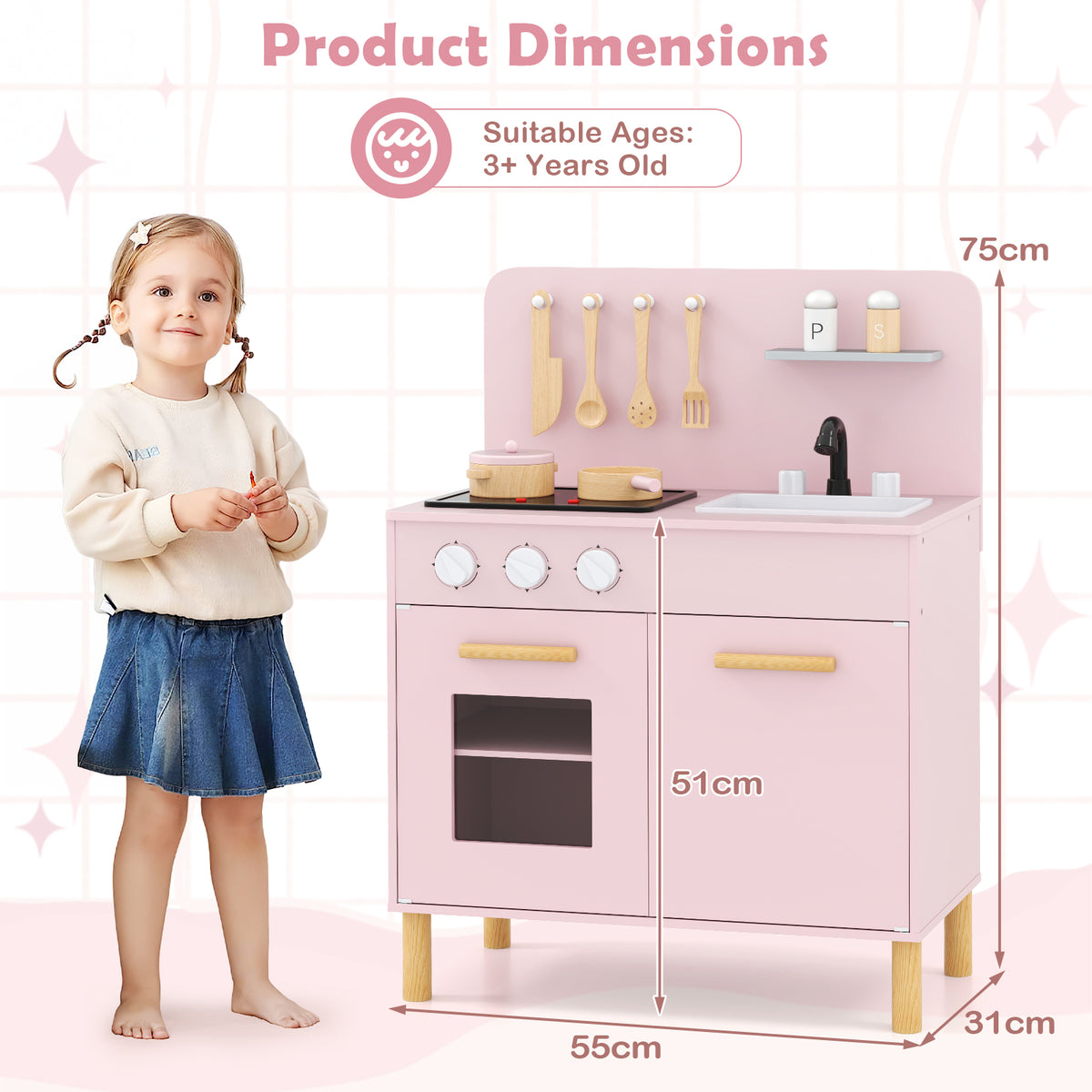 The play kitchen set next to a young girl showing the height and width dimensions