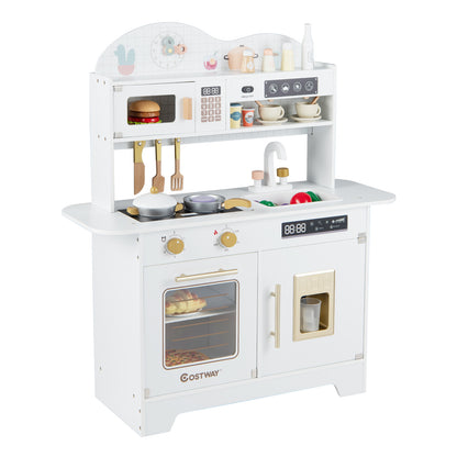 The white play kitchen set includes 17 accessories like pots, pans and utensils