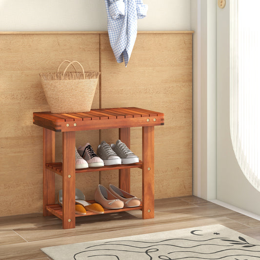 The shoe storage bench placed in a hallway with shoes on the shelves and a bag on the seat