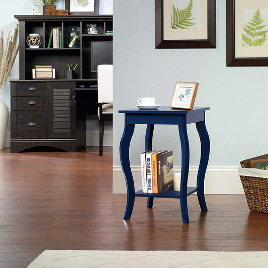 Blue end table with curved legs and two shelves in a home office setting