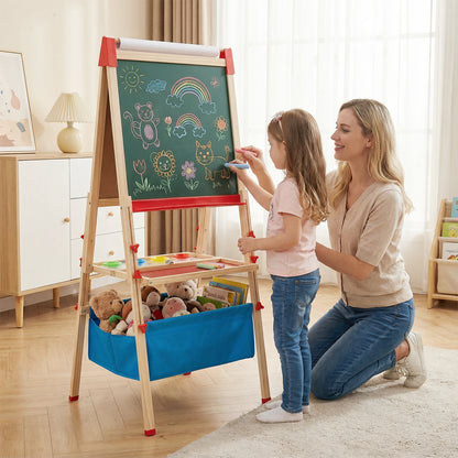 A mother and daughter drawing on the colourful art easel