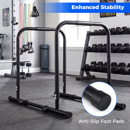 The dip bars are displayed with a focus on their stability and anti-slip foot design in a gym environment