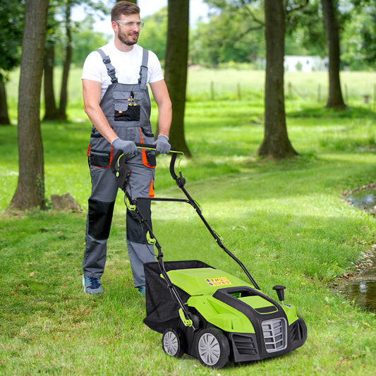 Man in overalls using the green electric dethatcher and scarifier on a lawn