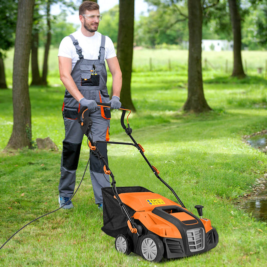 The orange lawn care tool being pushed across a grassy garden area