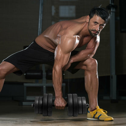 Man performing a bent over row with the adjustable weight dumbbell set