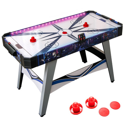 Air Hockey Game Table with LED lights and four pucks on the playing surface