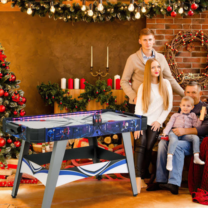 The game table set up in a living room decorated for the Christmas holidays