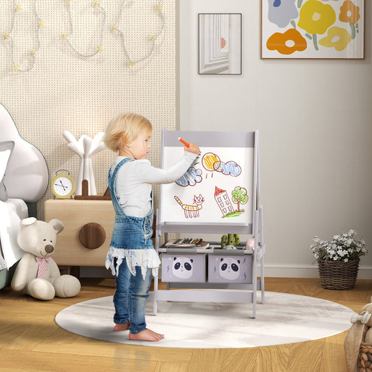 A young child drawing on the whiteboard side of the art easel in a bright playroom