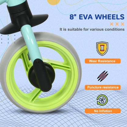 Close-up of the 8" EVA wheels on the green balance bike, highlighting wear and puncture resistance