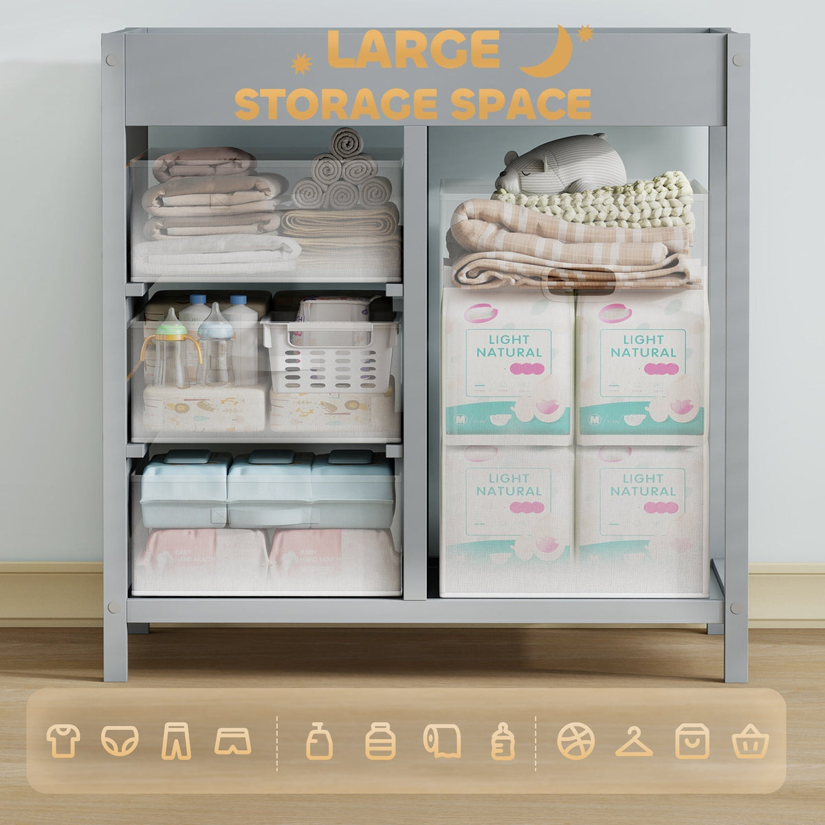 Baby changing unit with 4 storage drawers filled with baby items