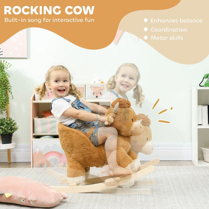 A child enjoys riding the rocking cow, which has built-in song for interactive play