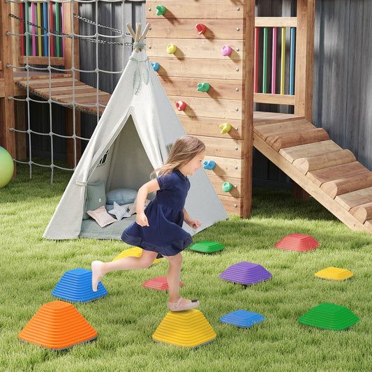 A young girl is playing on a set of colourful stepping stones in a garden obstacle course