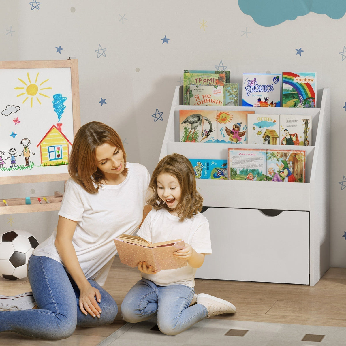 The kids storage unit placed in a playroom next to a mother and child reading