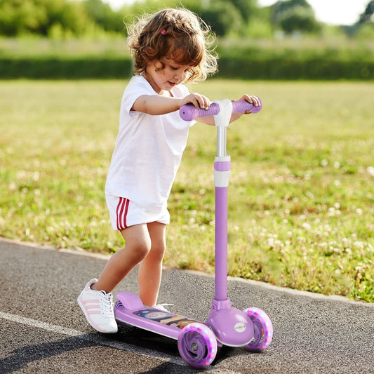 A young girl riding the purple three-wheel kids scooter outdoors on a track
