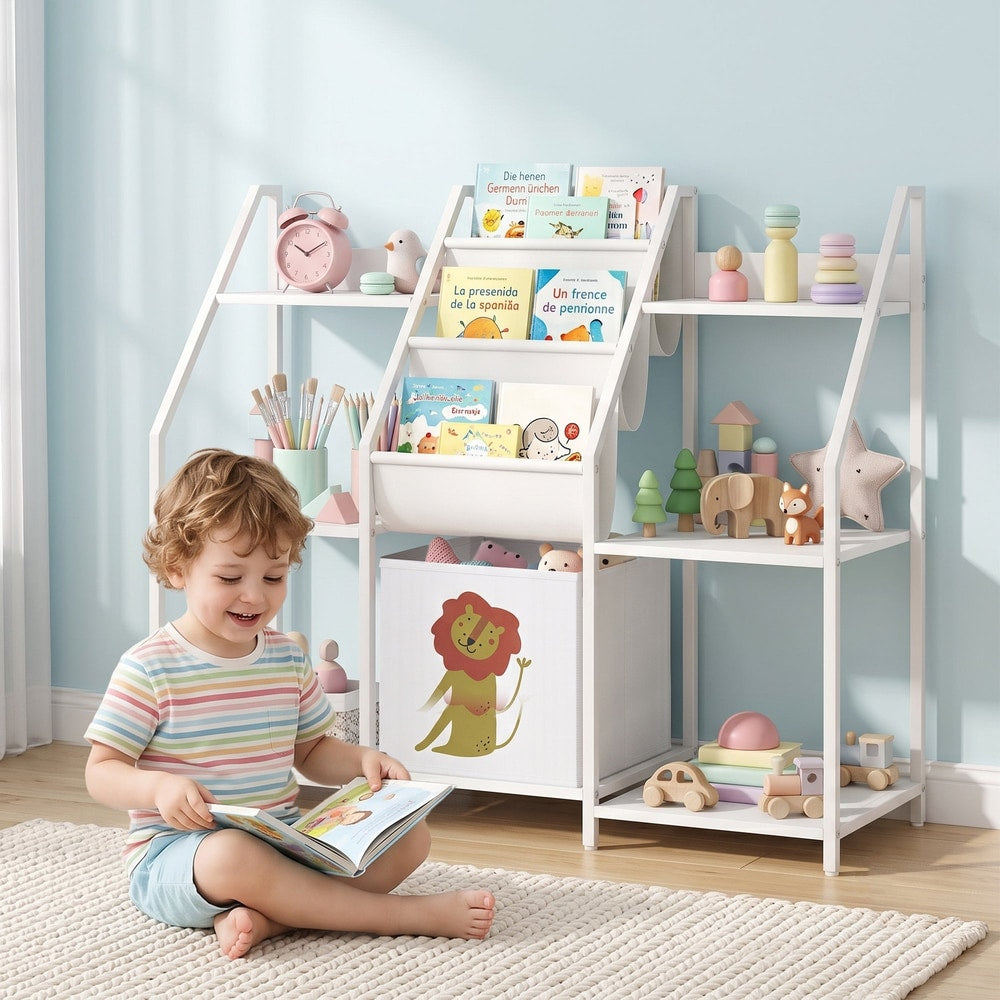 Child reading a book next to the white kids bookshelf and toy storage unit