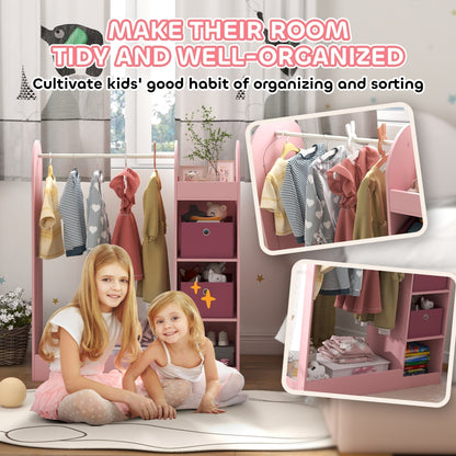 The pink children's clothes rail with storage shelf in use in a child's bedroom with clothes and toys