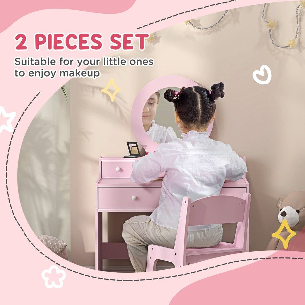 A girl uses the pink dressing table set, looking in the mirror
