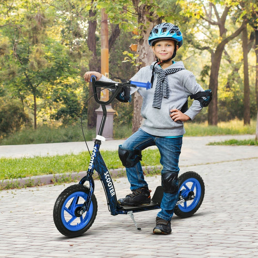 A young boy wearing a helmet and pads standing on the kids scooter in a park