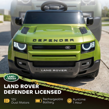 Front view of the green ride-on car with illuminated headlights and brand logos visible