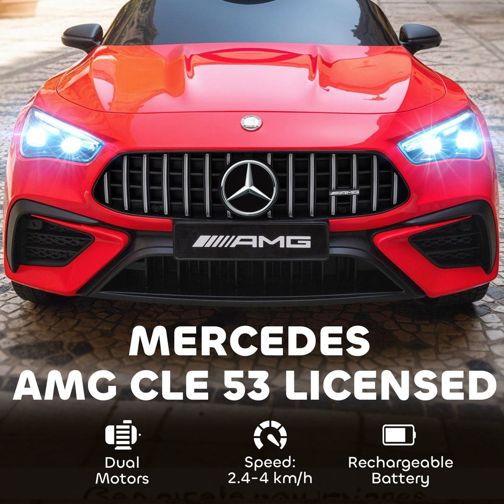 Close-up of the front grille and headlights of the red kids electric car, showing 'AMG' badge