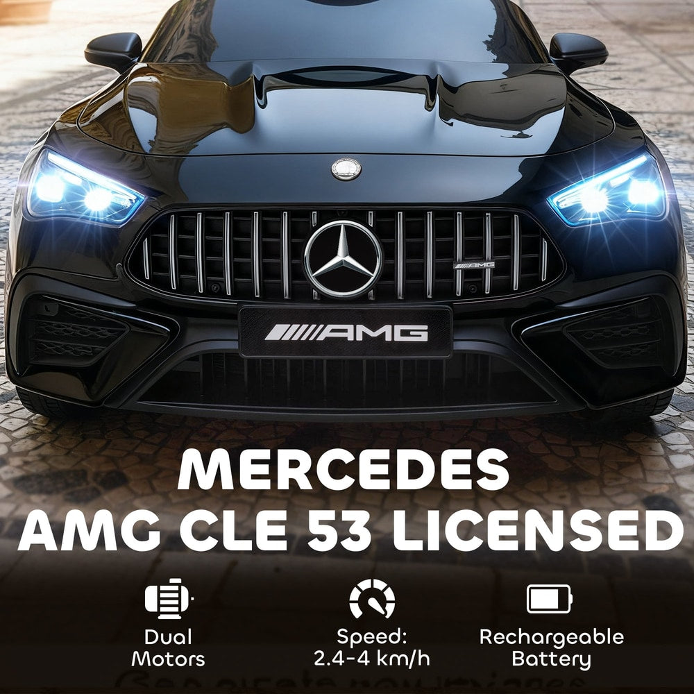 Front view of the black kids electric car, featuring the AMG grille and illuminated headlights