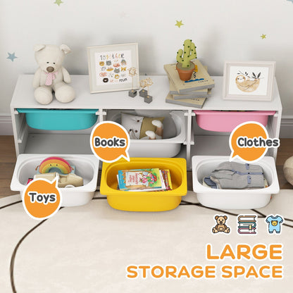 The kids storage unit with bins pulled out to show space for toys books and clothes