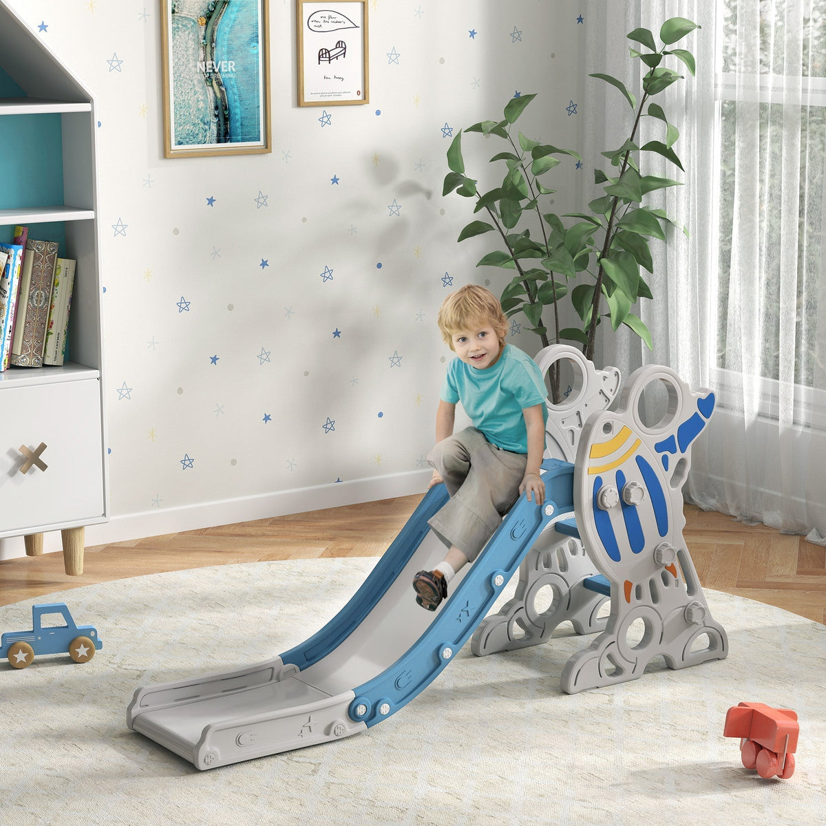 The kids slide being used by a young child in a bright nursery room