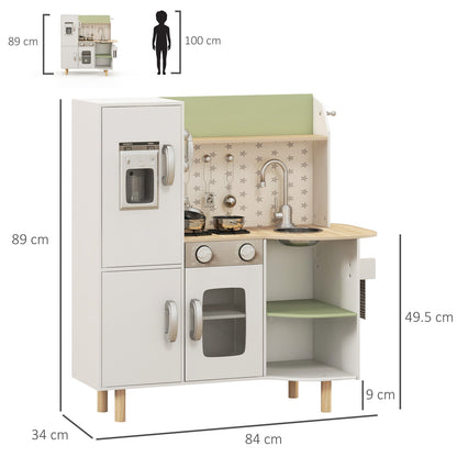 Dimensions of the white role play toy kitchen are shown with a child silhouette for scale