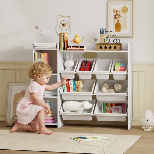 Child playing with toys in a white kids storage unit with 8 bins and shelves