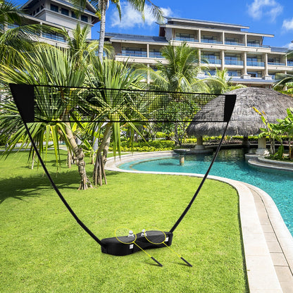 The sport equipment set packed away in its base, sitting on grass near a resort pool