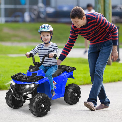 A young boy rides the blue kids electric quad bike while a man supervises outdoors