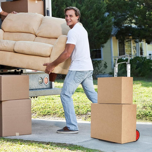 The sack truck barrow being used to move a sofa out of a van