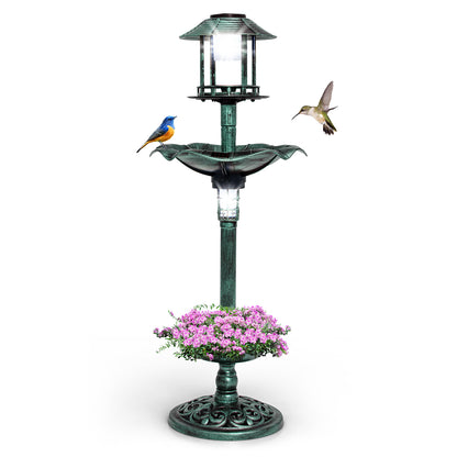 Antique Lighted Birdbath and Feeder Combo with two solar lamps and pink flowers on a white background
