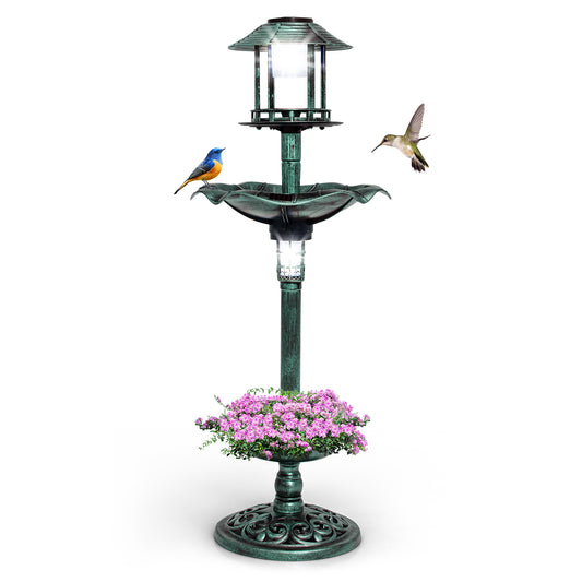 Antique Lighted Birdbath and Feeder Combo with two solar lamps and pink flowers on a white background
