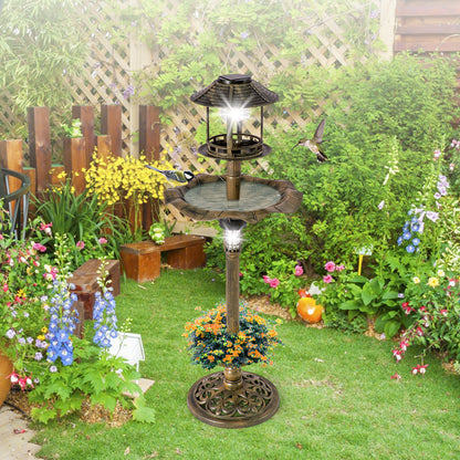 The antique lighted birdbath and feeder combo stands in a garden with a hummingbird and a bird