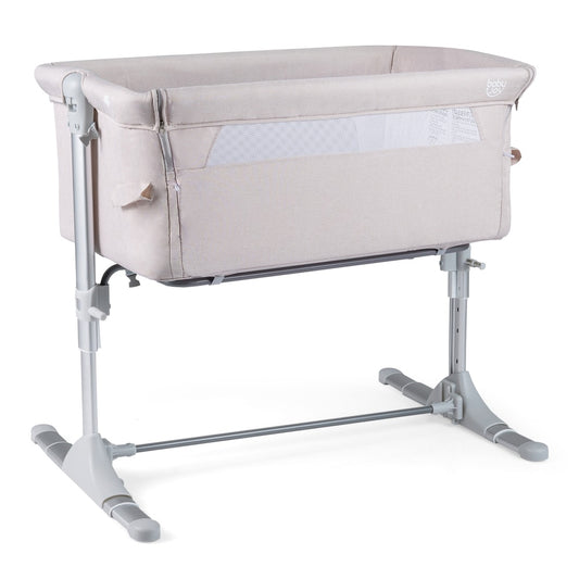Baby Bassinet Crib Bedside Sleeper with Adjustable Height in beige, showing the full product on a white background