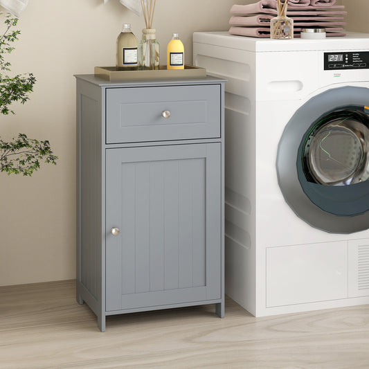 Grey floor cabinet with a single door and drawer, placed next to a washing machine