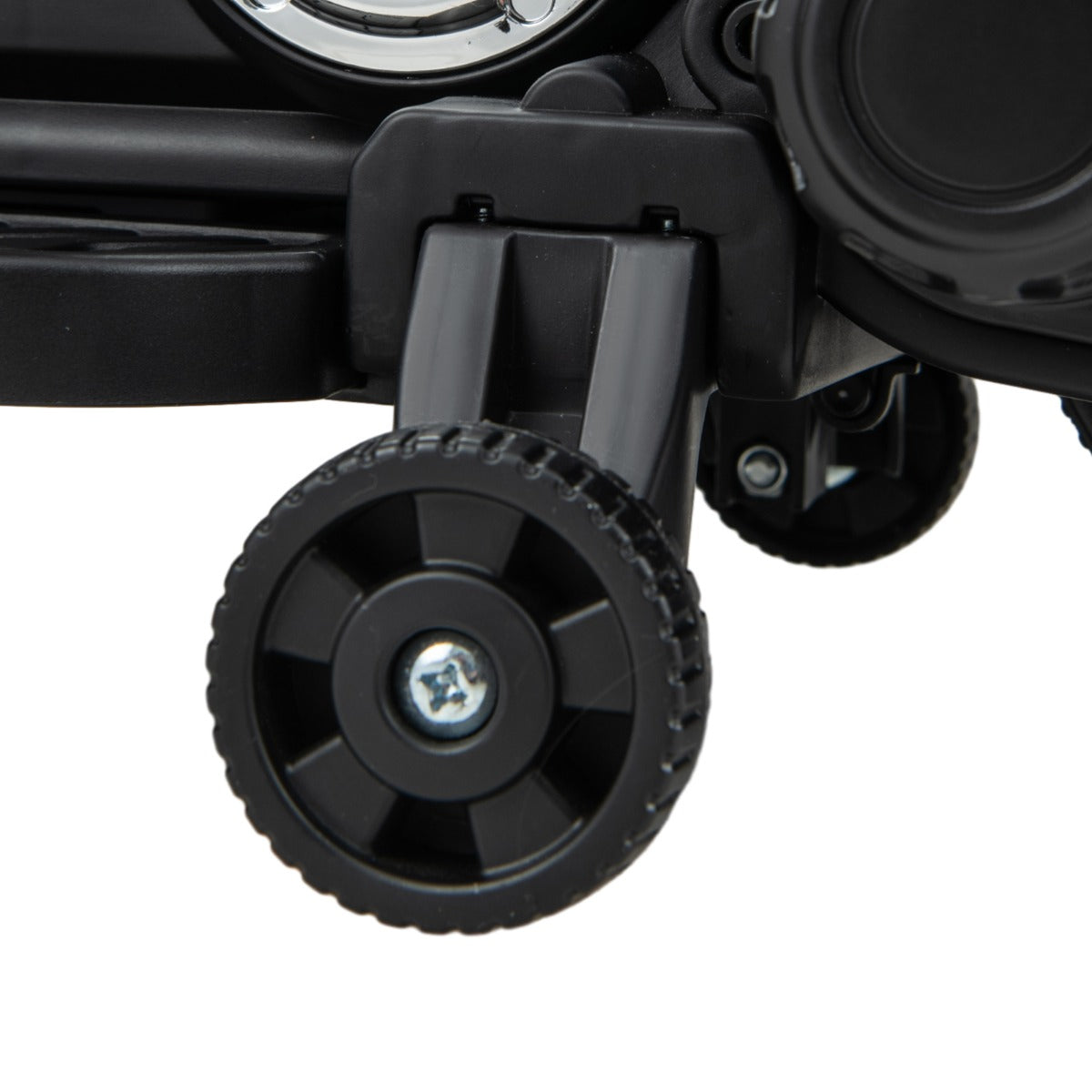 A close-up of the small black training wheel attached to the side of the kids electric motorbike