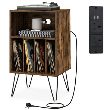 Record player stand with vinyl records and a mug, showing integrated power outlet
