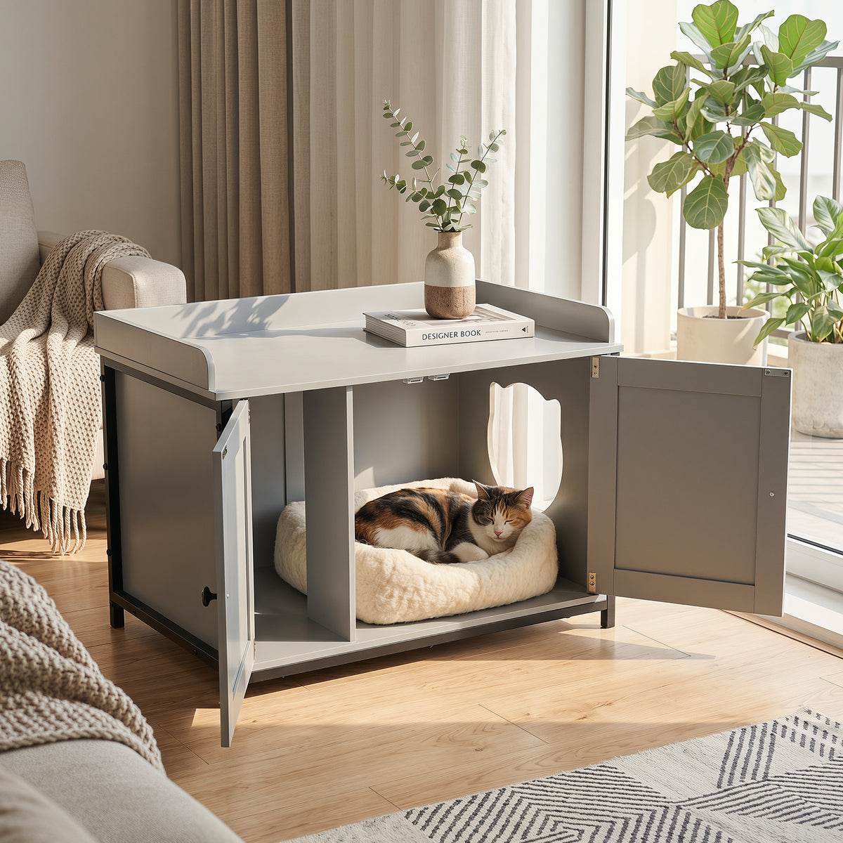 The cat furniture with one door open showing a cat bed inside