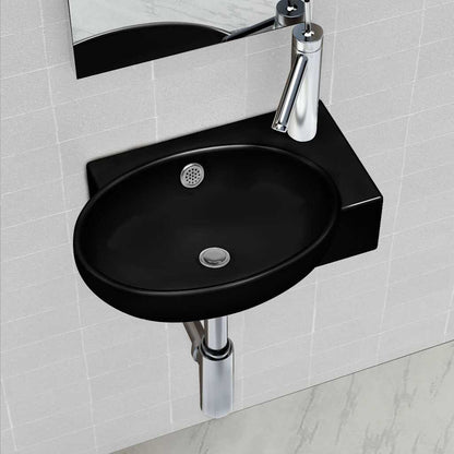 Ceramic bathroom sink basin faucet/overflow hole black round, a black round basin with a chrome faucet and overflow hole