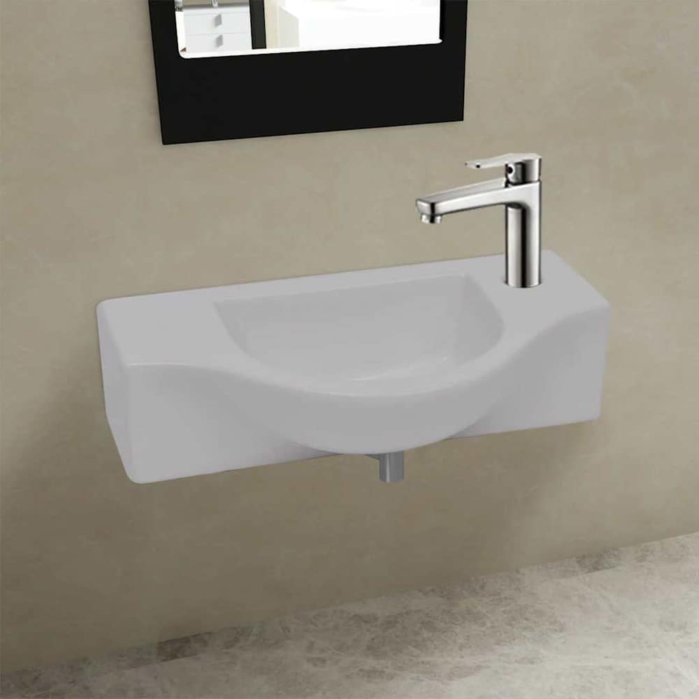 Ceramic Bathroom Sink Basin with Faucet Hole White mounted on a wall with a chrome faucet