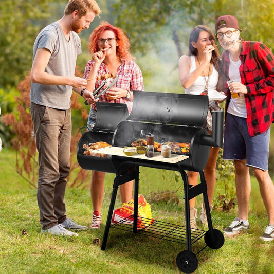 People enjoying a barbecue party with the outdoor grill in a garden setting