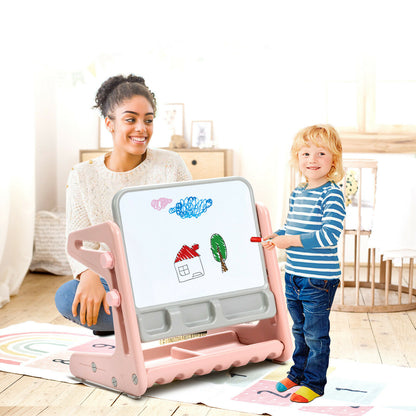A woman and child using the art easel and chair set together