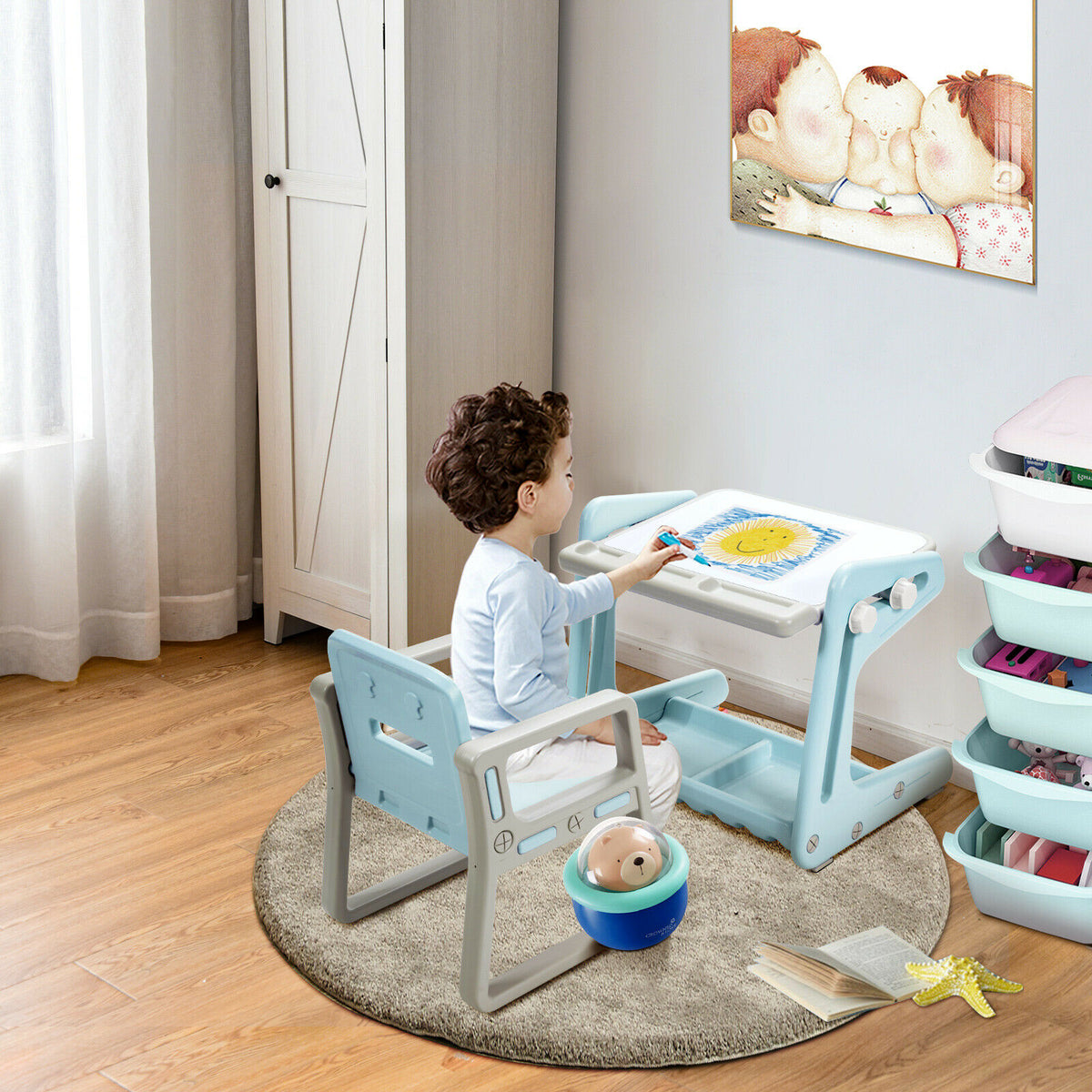 The art easel and chair being used by a young child drawing on the white surface