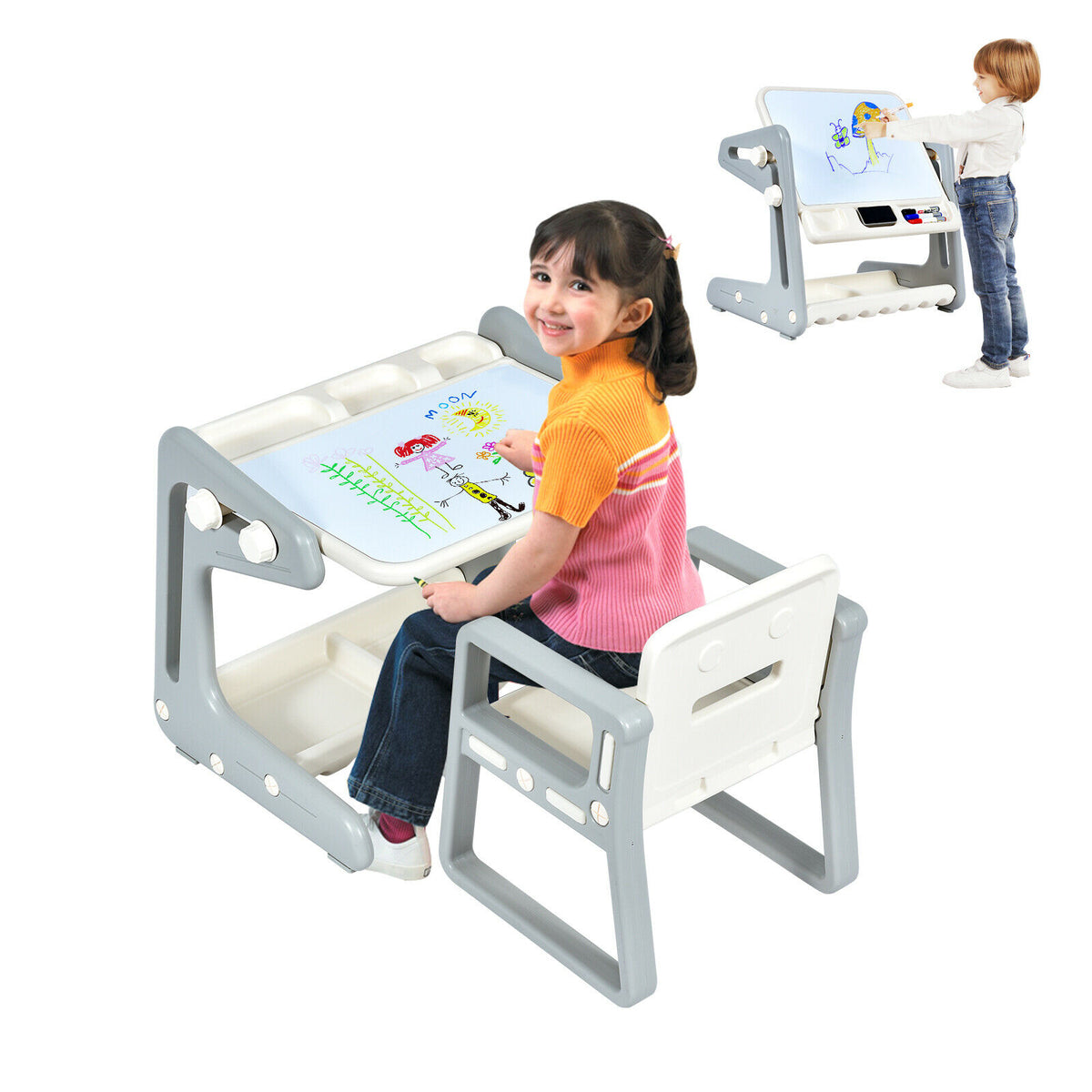 A young girl sits at the art easel table and chair set drawing