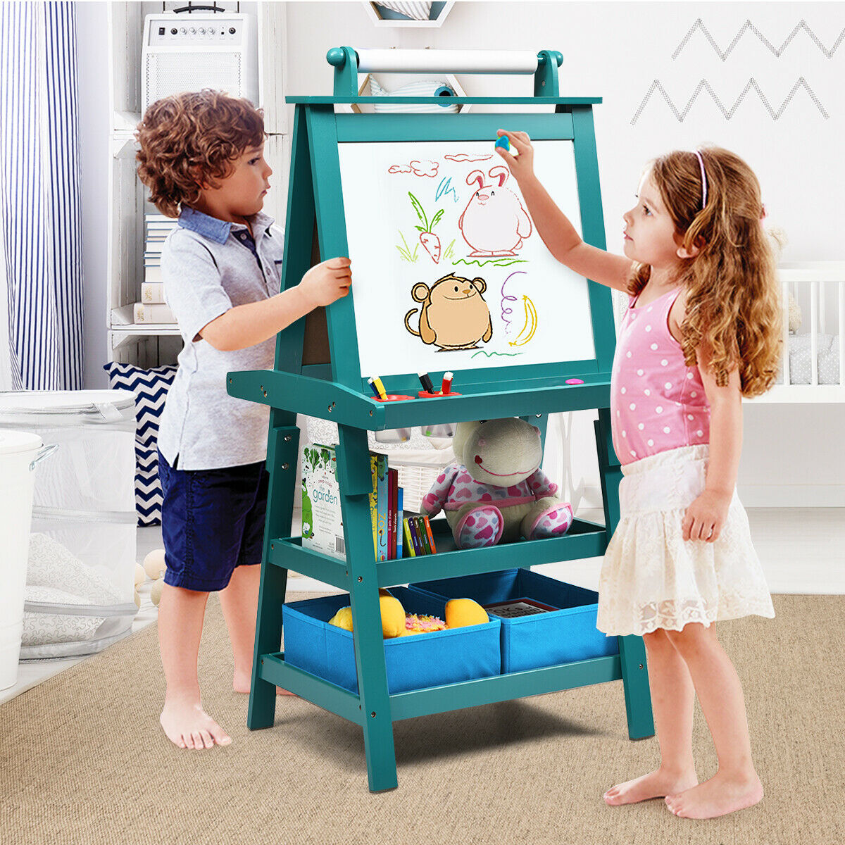 Two children drawing on the art easel, one on the whiteboard and one on the chalkboard