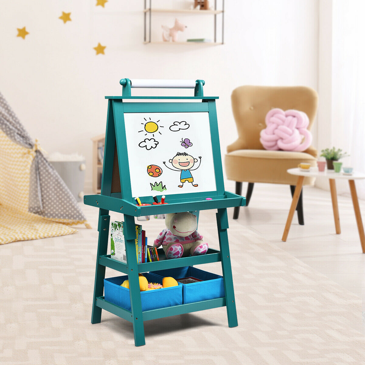 The blue children's art easel with paper roll in a bright, child-friendly room