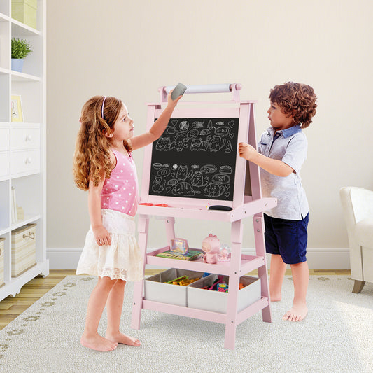 Two children drawing on the pink art easel in a bright room